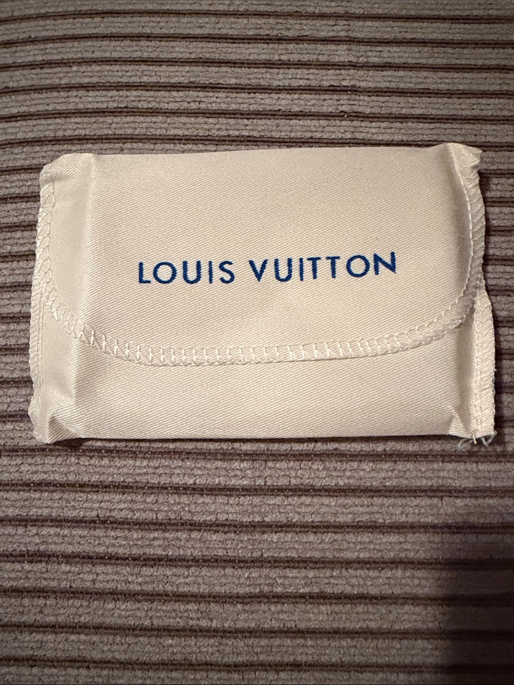 NWOT- Designer- like Small Cream Pouch (for a wallet) with Blue Logo Print